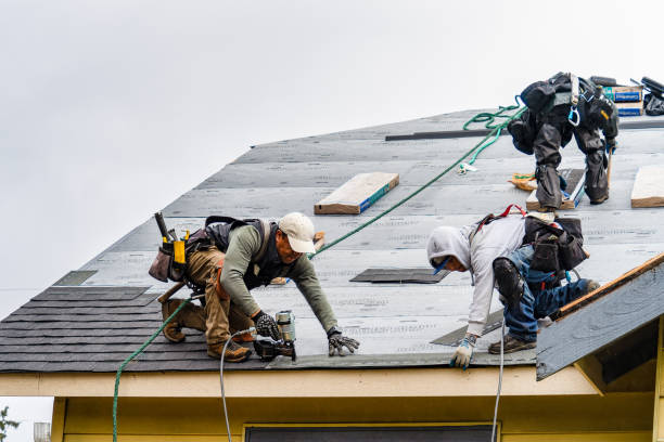 Professional Gutter Installation technician working in Lincoln, NH